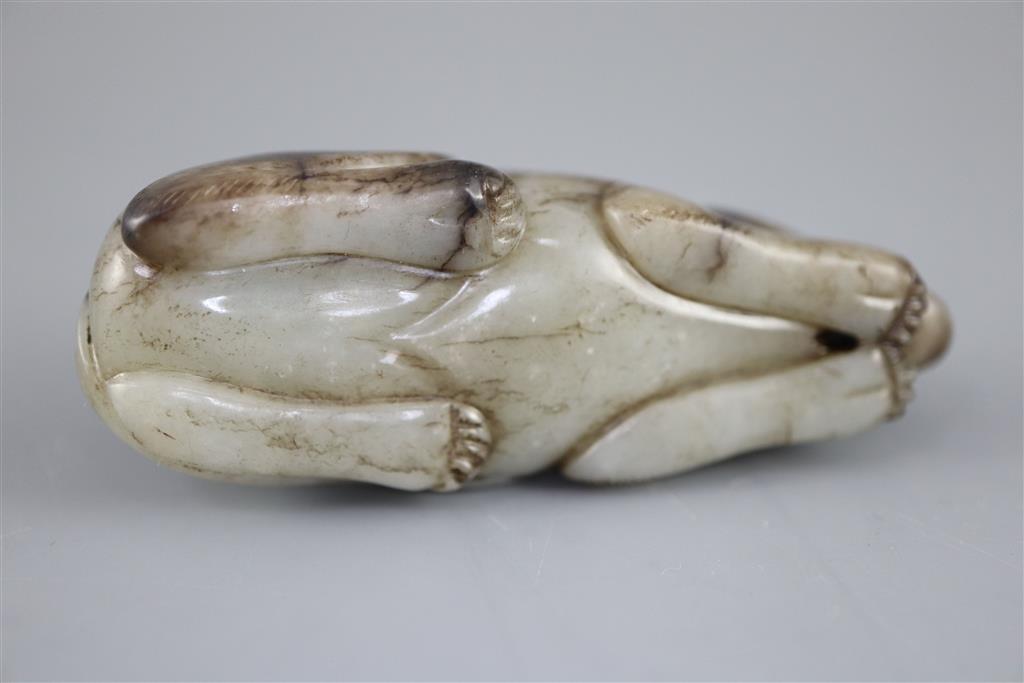 A Chinese grey and black jade figure of a recumbent mouse, 7.7cm long